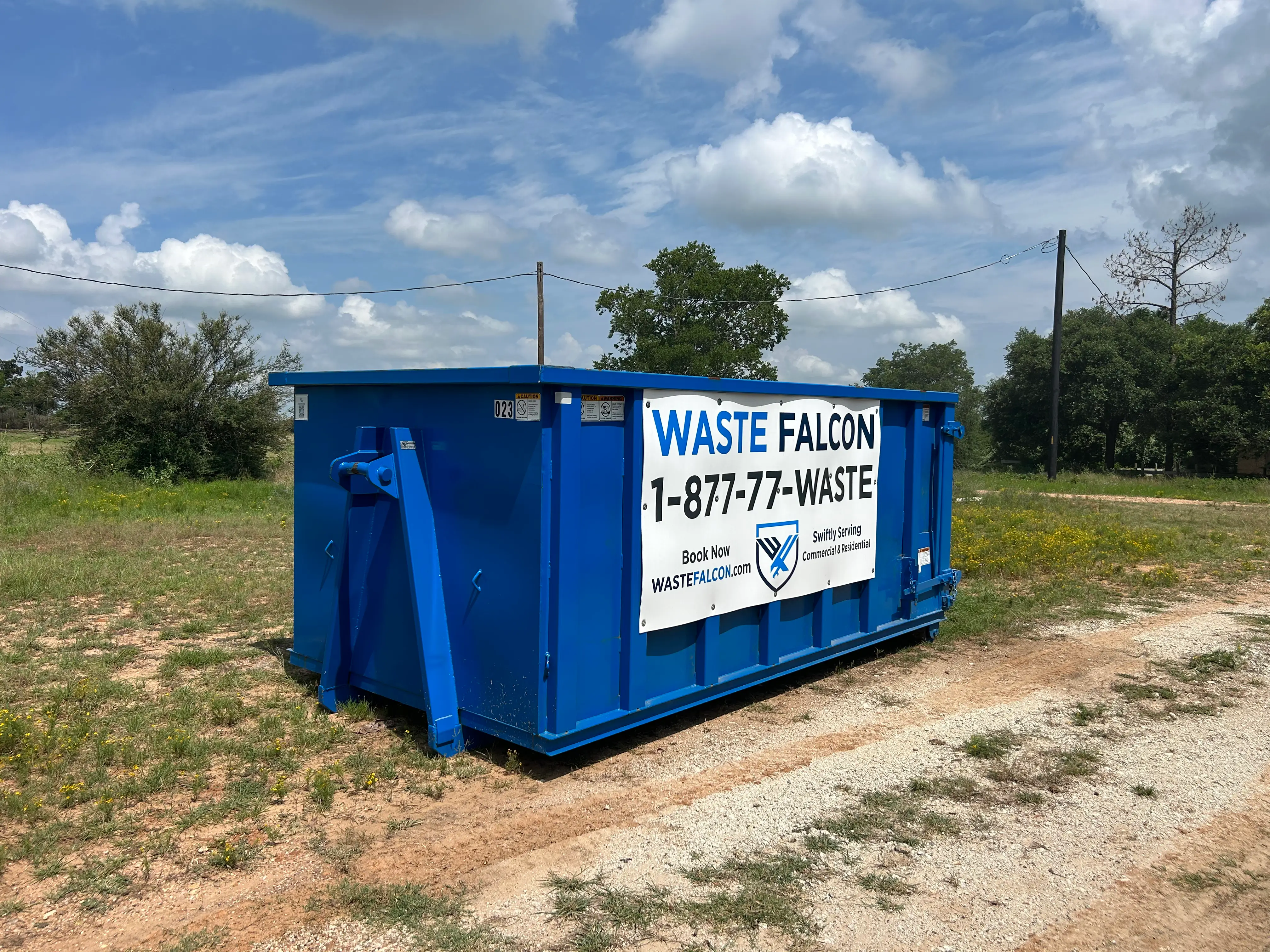 Waste Falcon Construction dumpster rental at job site